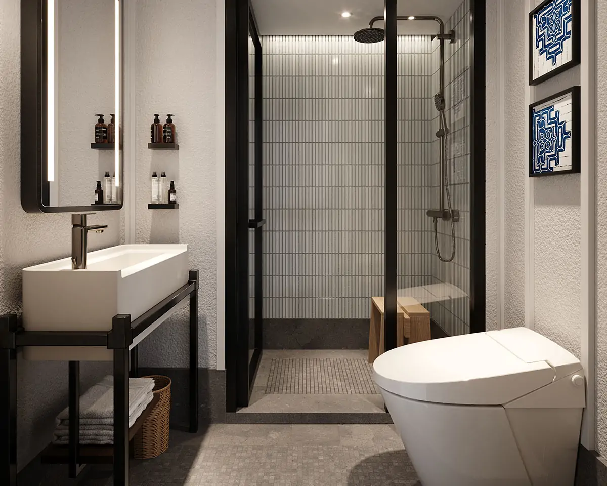 シャワーとシンクが完備されたホテルのモダンなバスルームデザイン