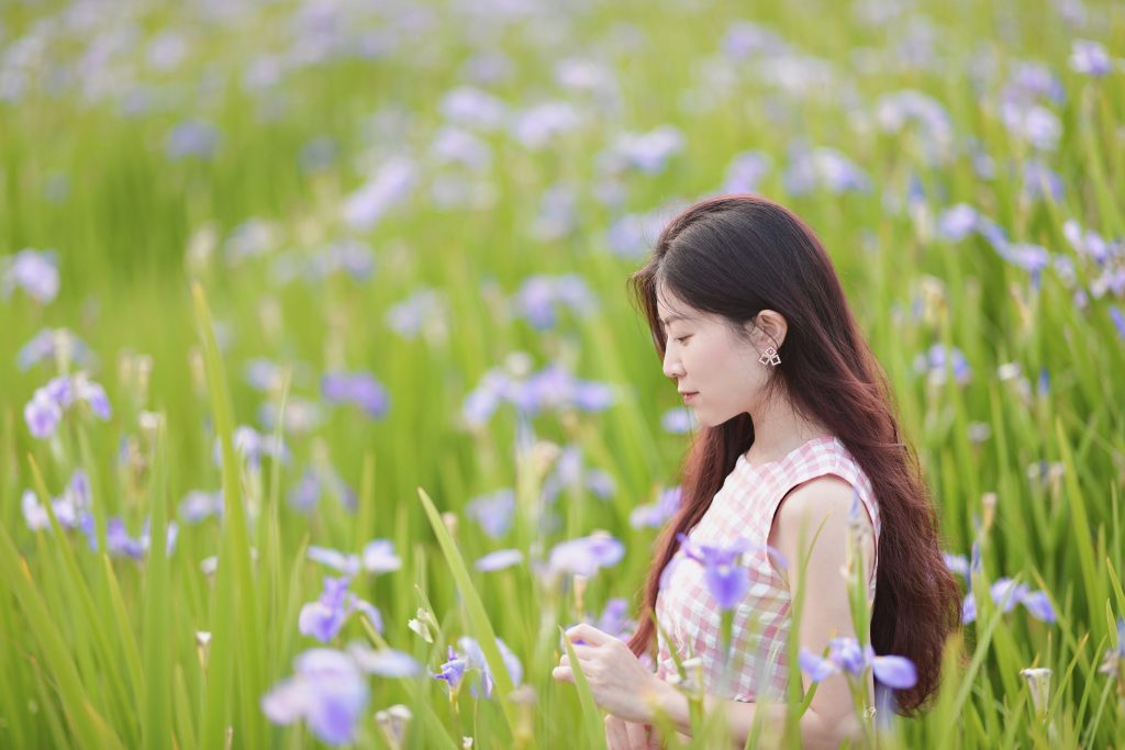 Side,View,Of,Woman,In,The,Iris,Farm