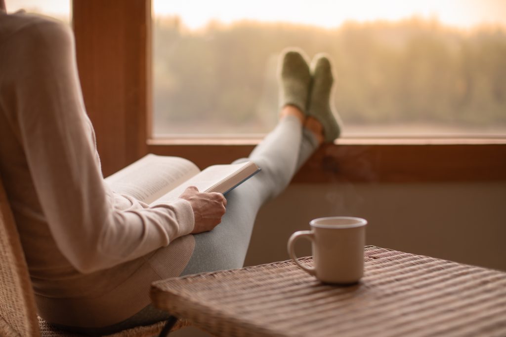 Woman,Person,Relaxing,At,Home,Reading,Book,Feeling,Relaxed,On